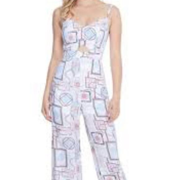 Guess Soliana Printed Wide Leg Jumpsuit Size Large Sweetheart Neck Peep Hole - Picture 1 of 16